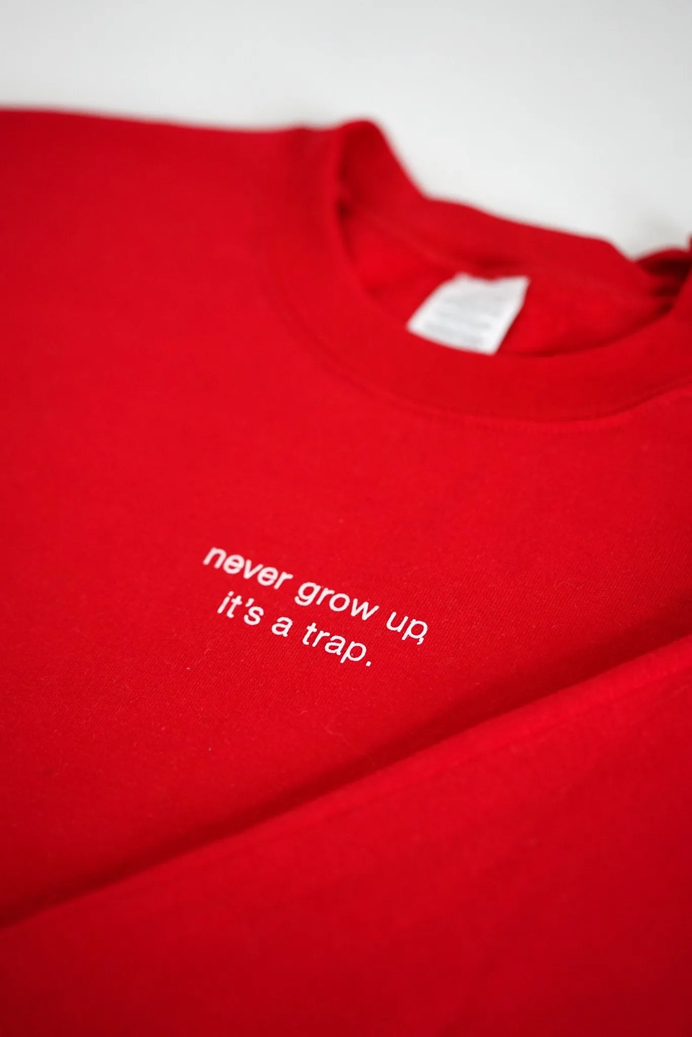 Never Grow Up Sweatshirt